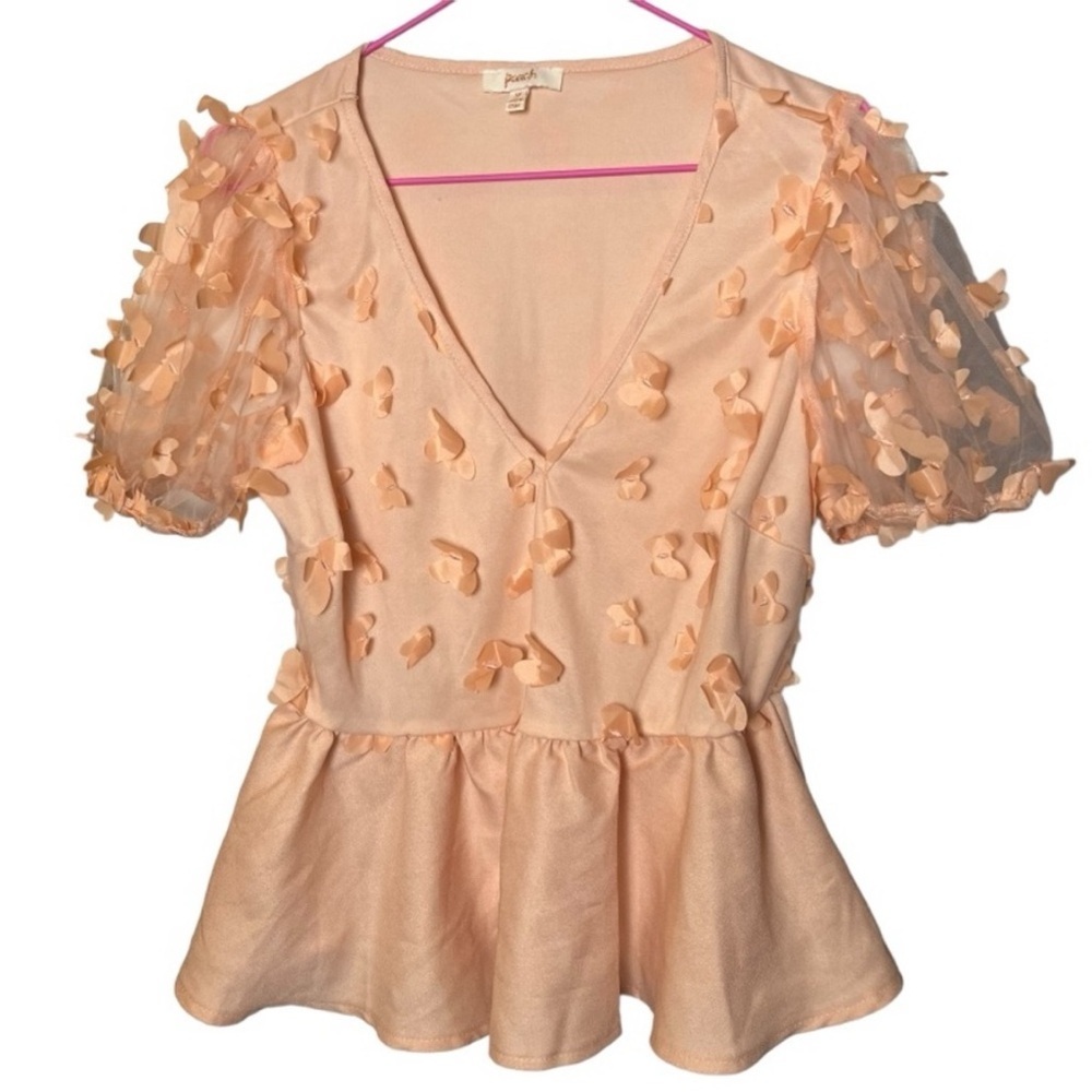 Peach butterfly peplum blouse